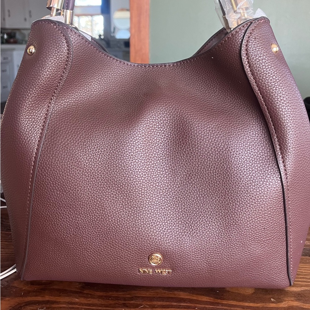 Brand new Nine West purse
Dark purple…eggplant color